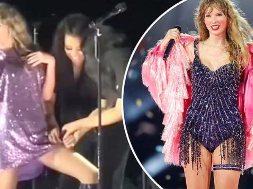 Taylor Swift përjeton një mosfunksionim të veshjes në skenë, gjersa këngëtarët mbështetës e ndihmojnë atë të zgjidhë problemin