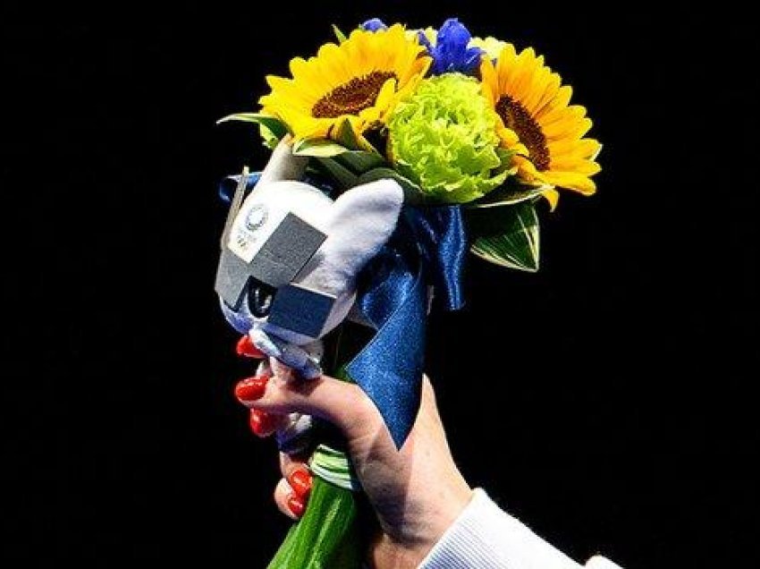 Lojërat Olimpike: Lulet e fituesve të medaljeve, ‘tribun’ për fatkeqësinë e vitit 2011