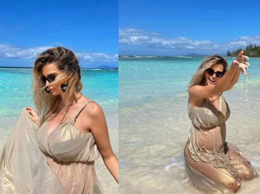Marina josh me pozat me fustan transparent nga plazhi